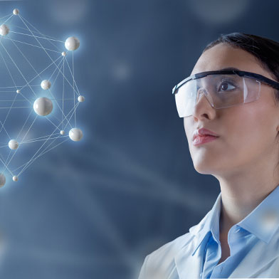 A nurse in protective eyewear gazes at a network of connected nodes, symbolizing the complex data analysis involved in nursing informatics. A nurse in protective eyewear gazes at a network of connected nodes, symbolizing the complex data analysis involved in nursing informatics.
